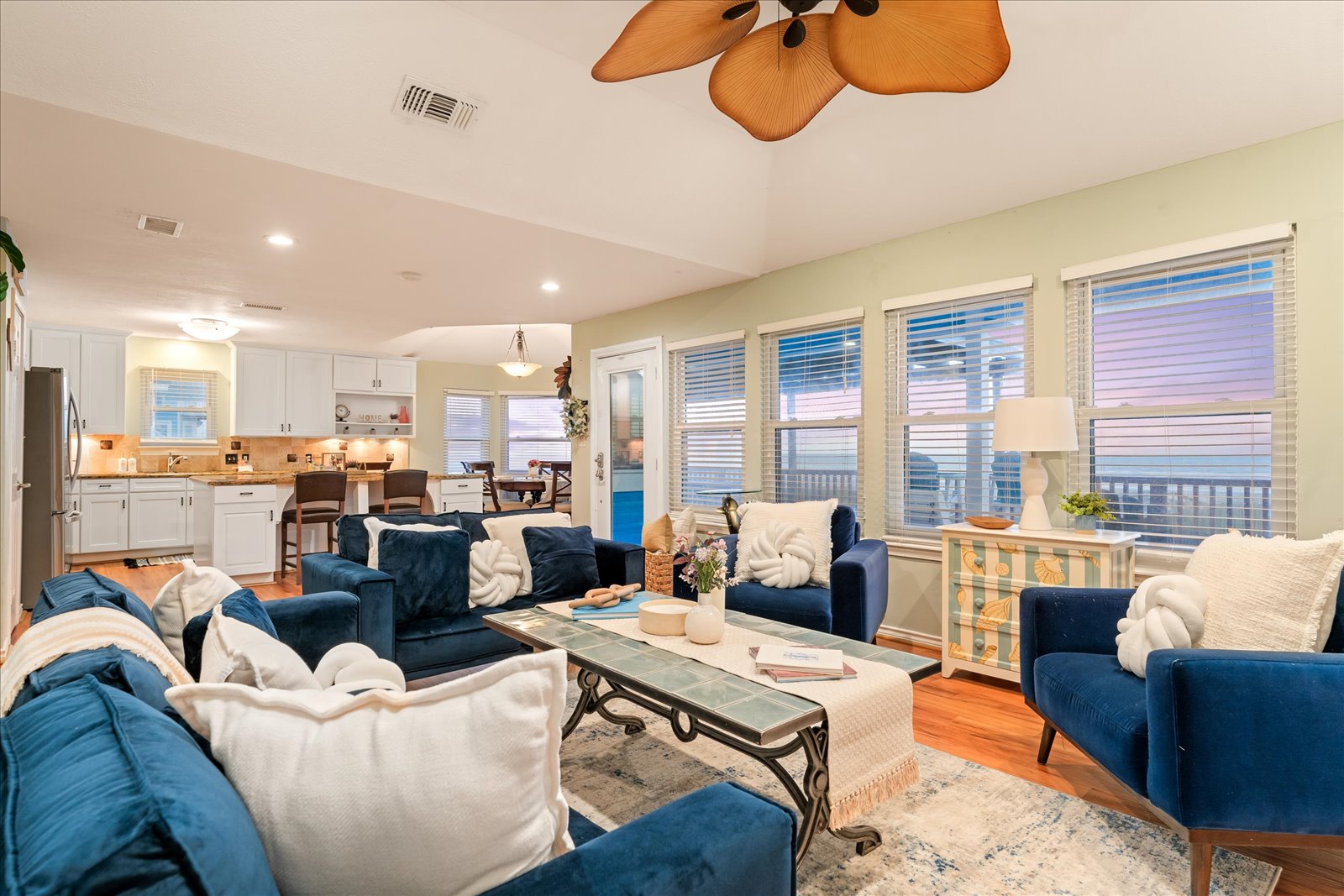 24043 Termini-San Luis Pass Road Galveston, TX 77554 - Photo 9 of 26 a living room with furniture kitchen view and a large window