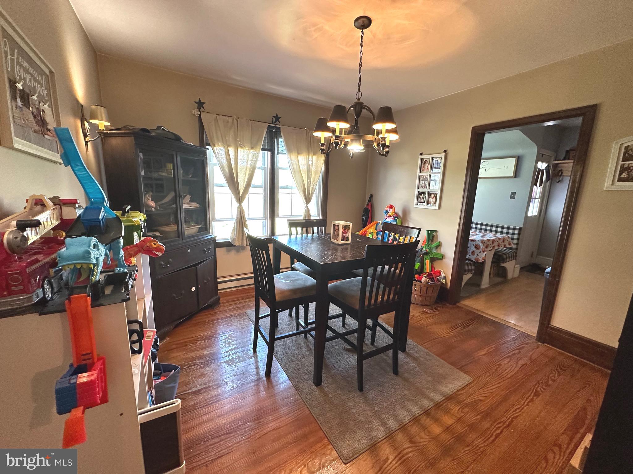 18452 Path Valley Road Dry Run, PA 17220 - Photo 13 of 45 a view of a dining room with furniture window and wooden floor