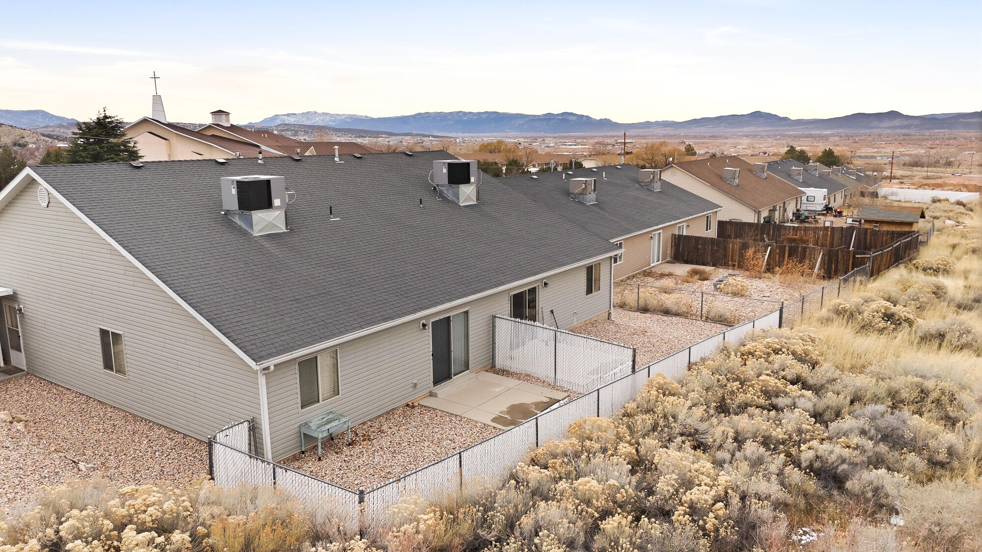 577-593 East Nichols Canyon Road, Unit 577579 & 591593 RV GARAGE Cedar City, UT 84721 - Photo 96 of 102 This unit features a fully fenced backyard and uncovered rear patio.