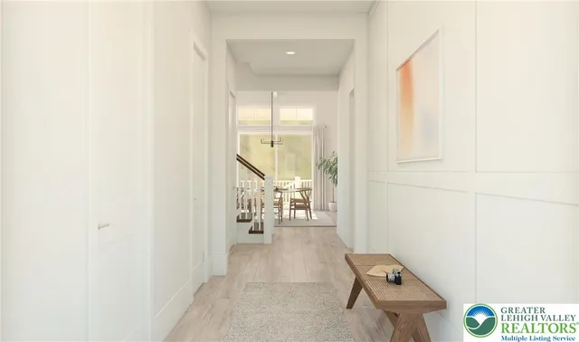 a view of entryway with livingroom