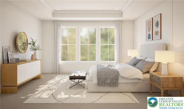 a bedroom with a bed a mirror and a window