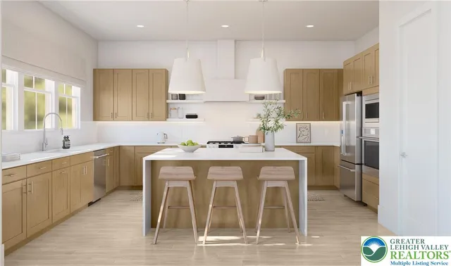 a kitchen with a table chairs refrigerator and microwave