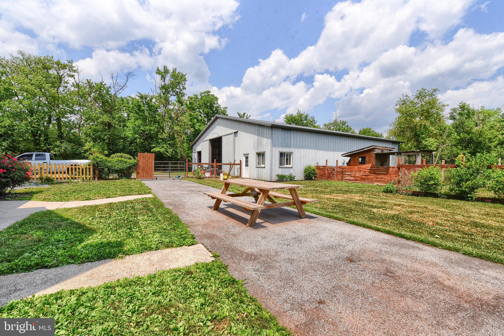 3740 Beagle Road Middletown, PA 17057 - Photo 61 of 70 a view of a house with backyard and sitting area