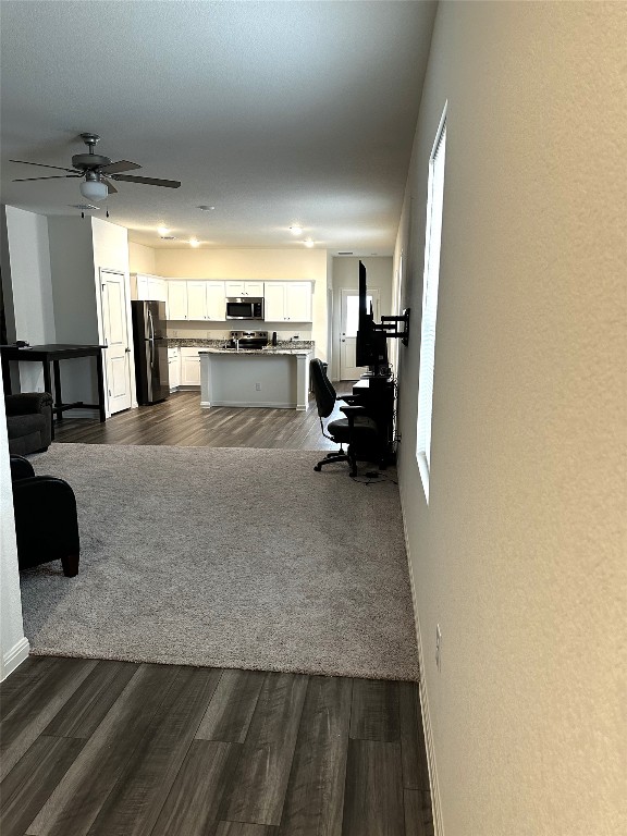 207 Enforcer Loop Jarrell, TX 76537 - Photo 3 of 15 a view of a living room and kitchen