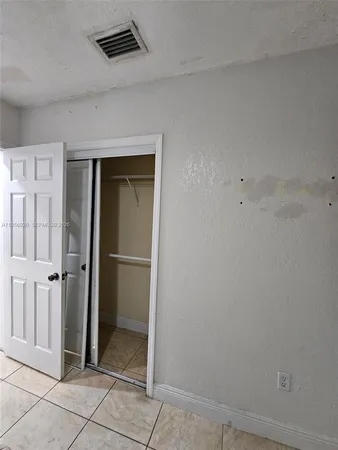 an empty room with closet