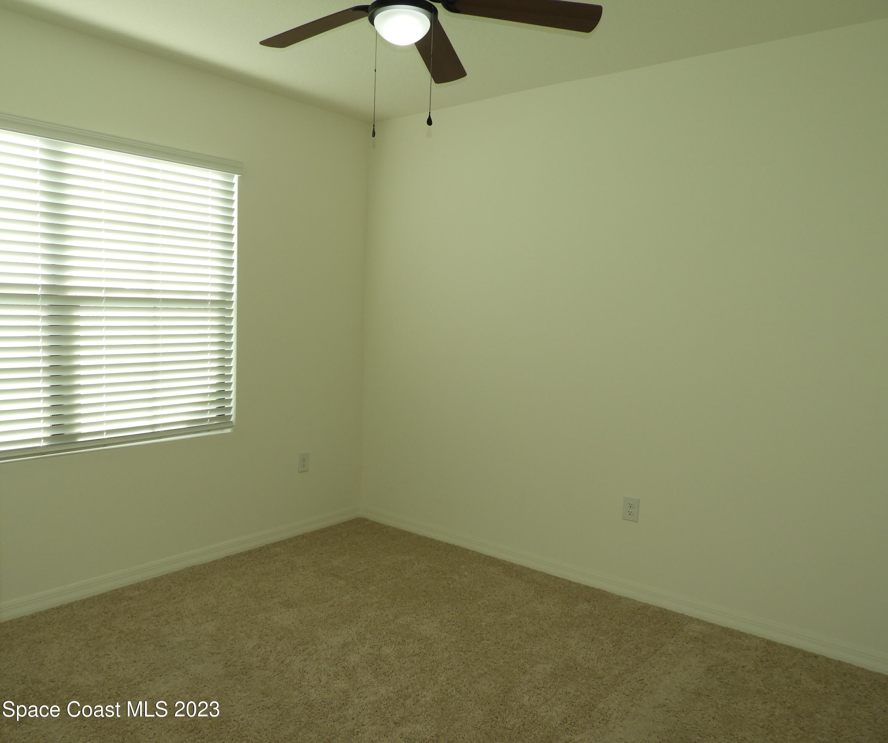 3782 Coachman Lane Southeast Palm Bay, FL 32909 - Photo 14 of 31 a view of a room with a window