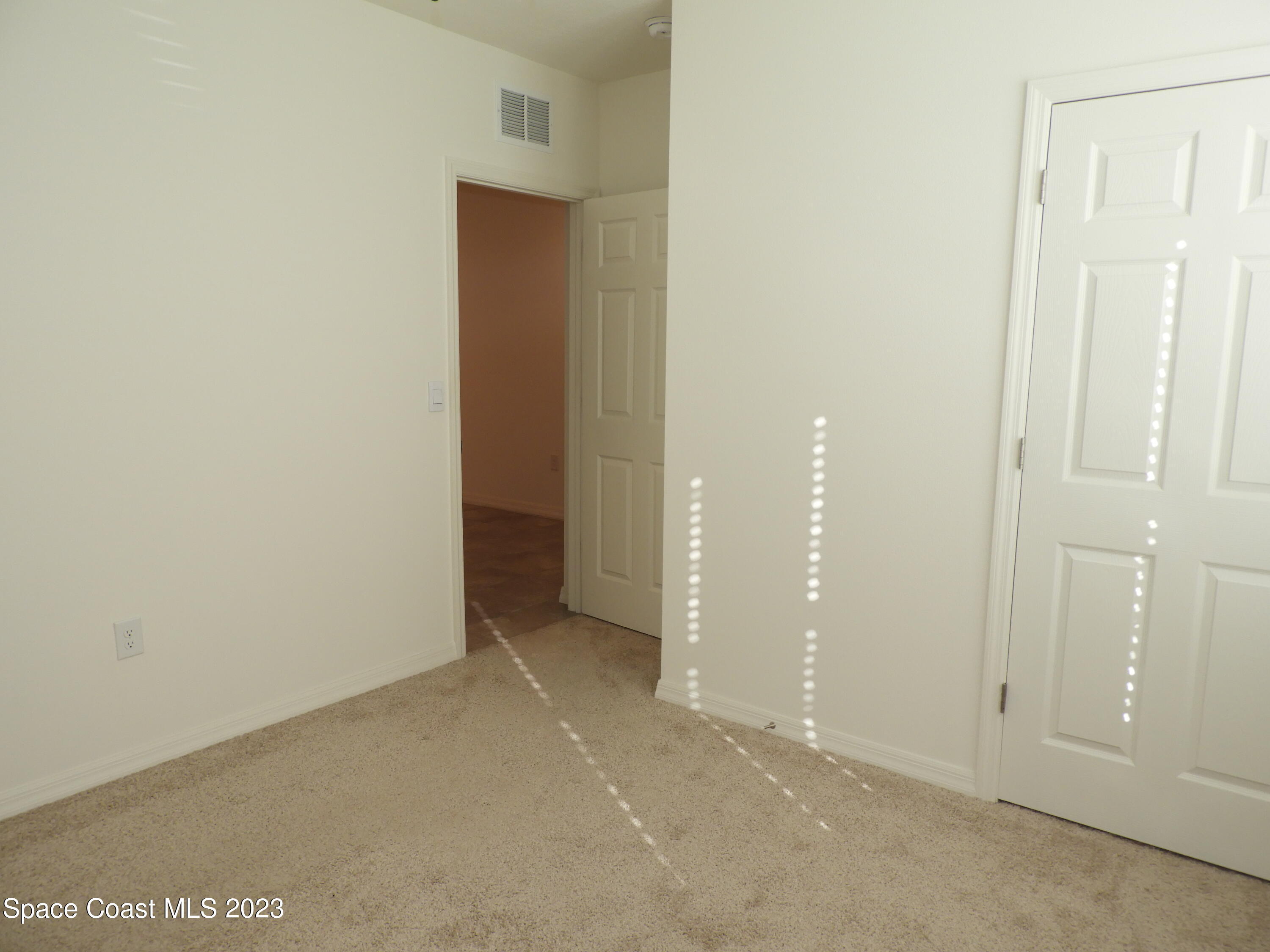 3782 Coachman Lane Southeast Palm Bay, FL 32909 - Photo 16 of 31 a view of an empty room