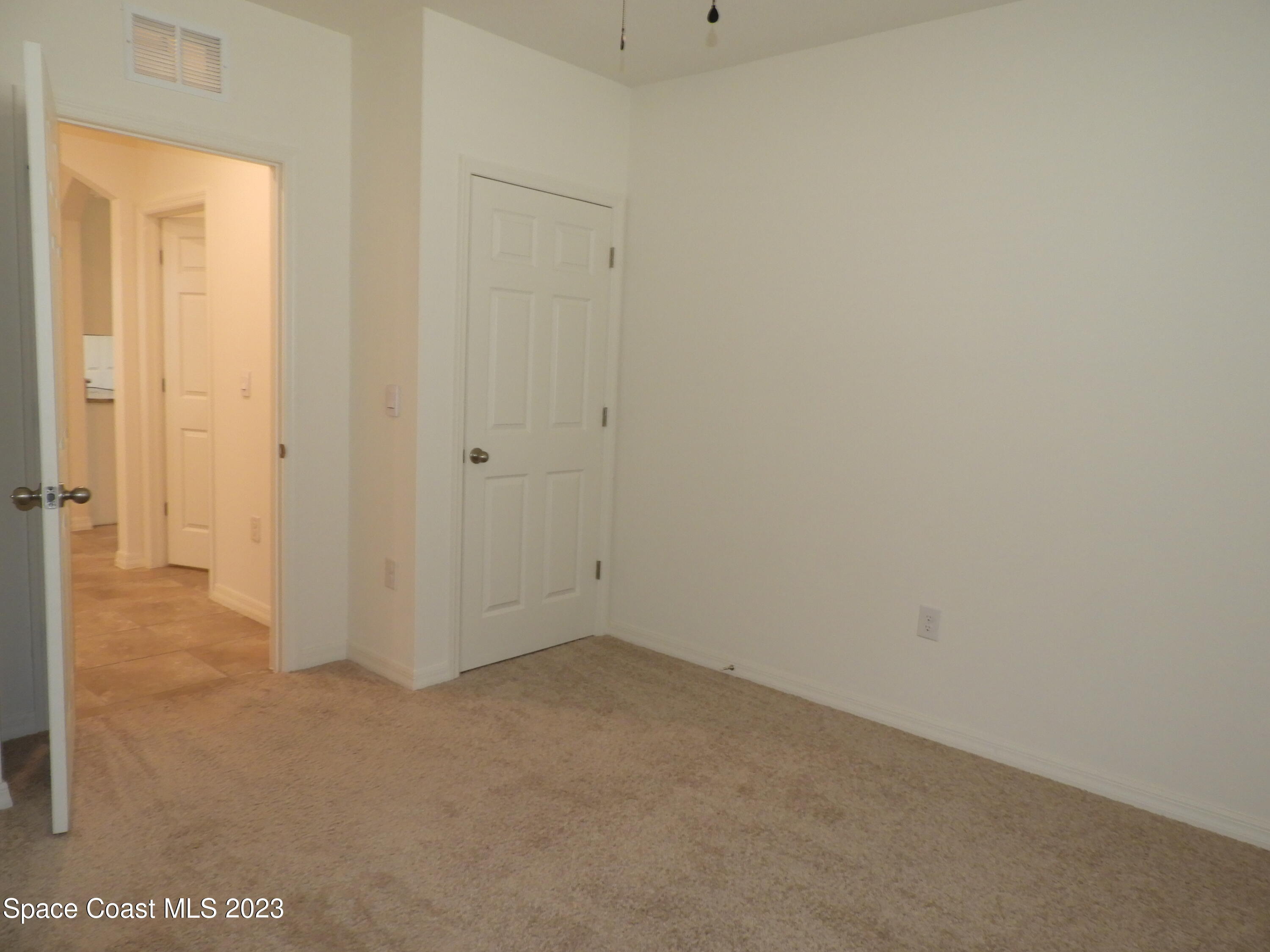 3782 Coachman Lane Southeast Palm Bay, FL 32909 - Photo 21 of 31 a view of an empty room