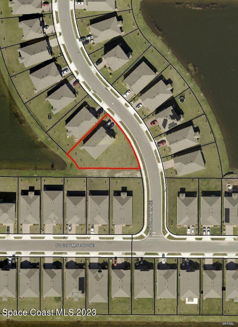 3782 Coachman Lane Southeast Palm Bay, FL 32909 - Photo 3 of 31 a view of swimming pool with outdoor seating