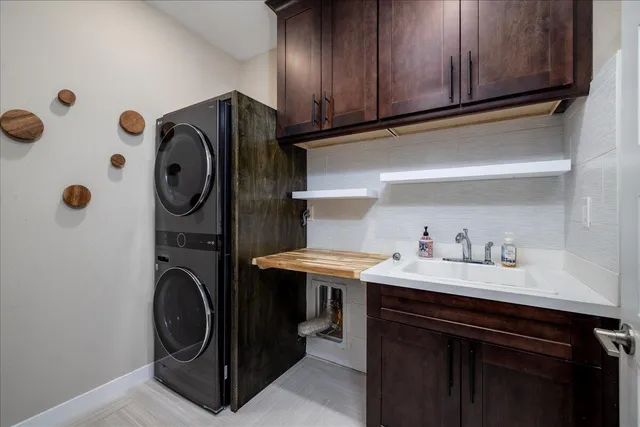 a kitchen with a stove and a sink