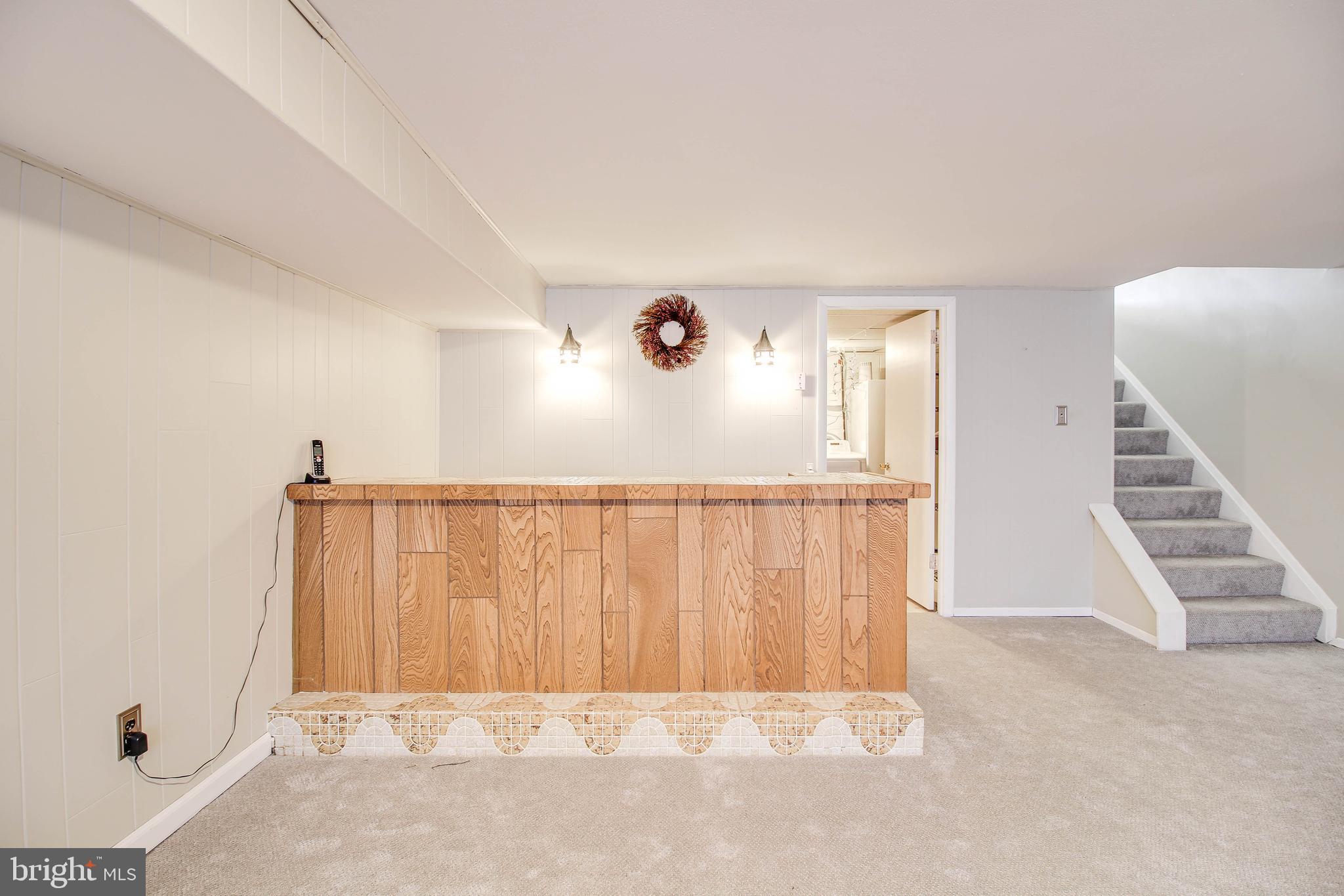 5649 Chelwynd Road Halethorpe, MD 21227 - Photo 28 of 44 a view of entryway with stairs
