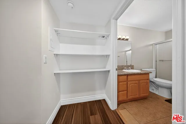a room with a cabinets and appliances