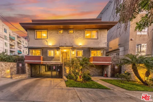 a front view of a multi story residential apartment building