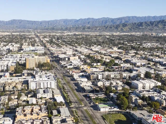 an aerial view of residential house and green space
