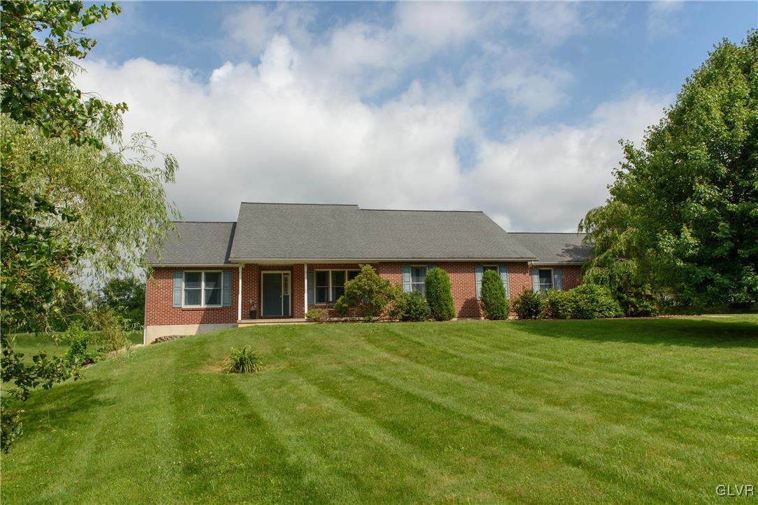 1213 Seifert Road Nazareth, PA 18064 - Photo 1 of 25 front view of house with a yard