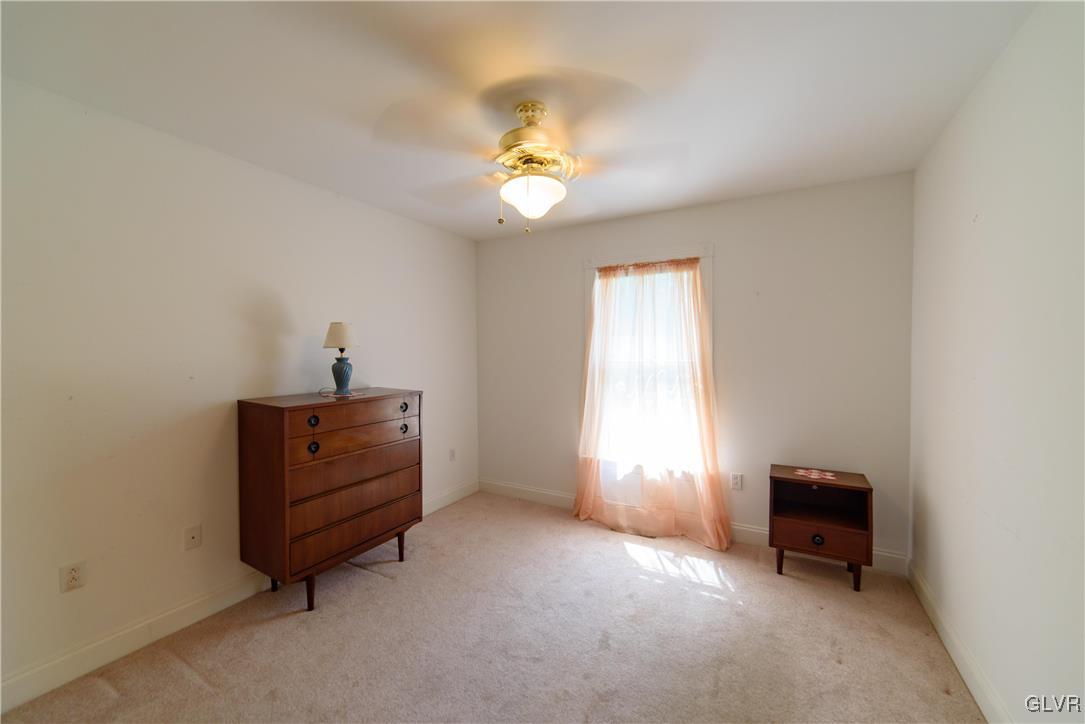 1213 Seifert Road Nazareth, PA 18064 - Photo 16 of 25 a living room with furniture and a window