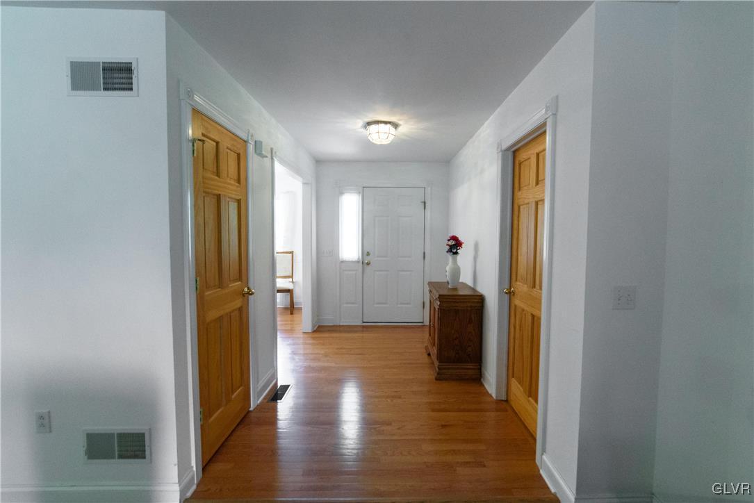 1213 Seifert Road Nazareth, PA 18064 - Photo 2 of 25 a view of a hallway with wooden floor and closet