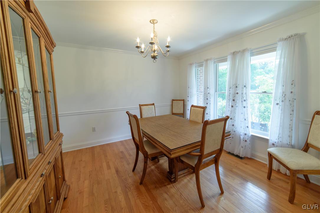 1213 Seifert Road Nazareth, PA 18064 - Photo 3 of 25 a view of a dining room with furniture window and wooden floor