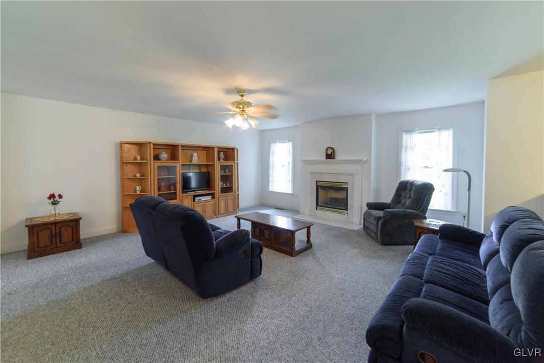 1213 Seifert Road Nazareth, PA 18064 - Photo 4 of 25 a living room with furniture and a fireplace