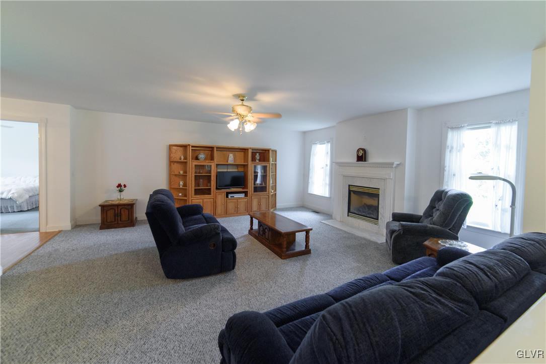 1213 Seifert Road Nazareth, PA 18064 - Photo 5 of 25 a living room with furniture and a fireplace