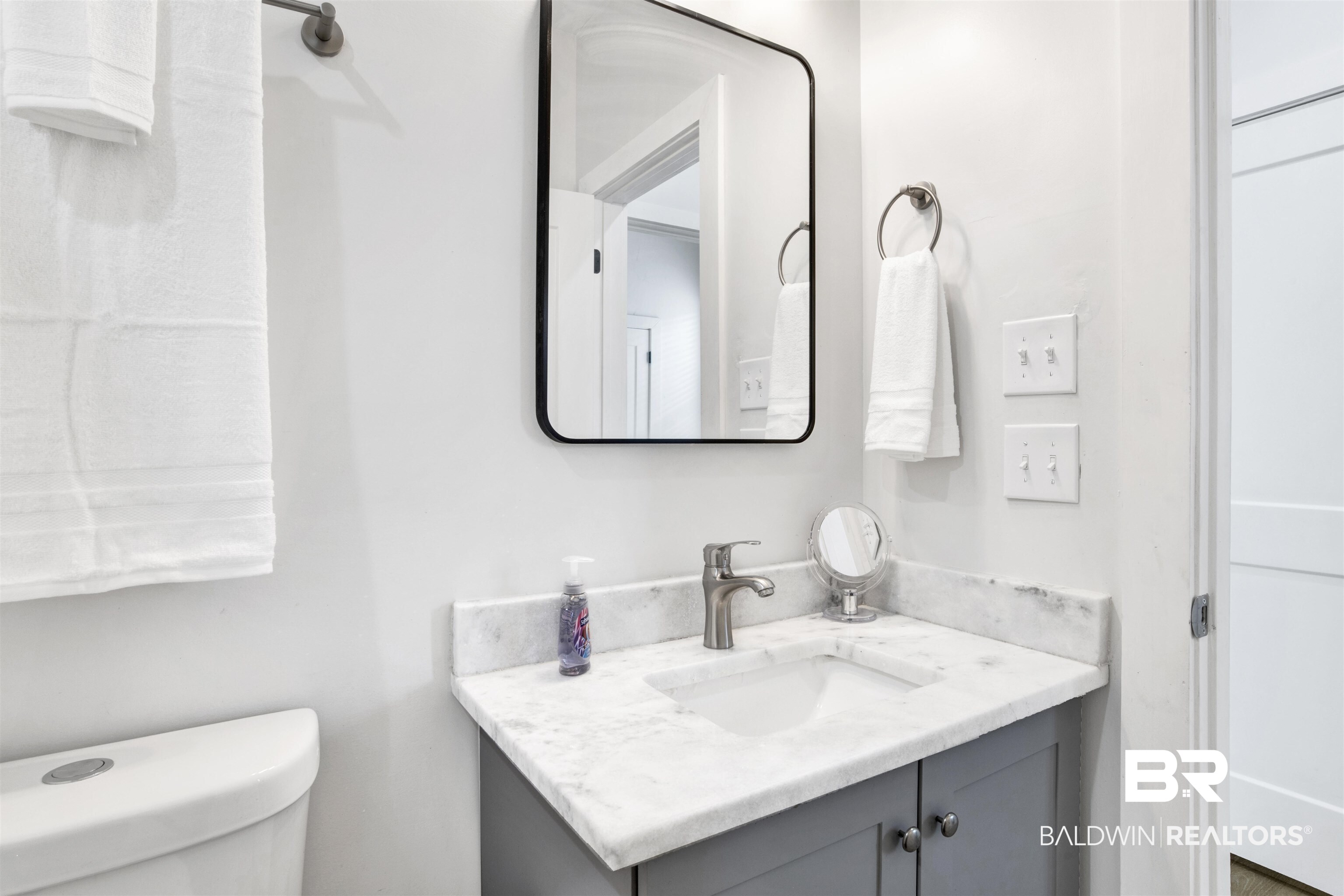 555 Congress Street Mobile, AL 36603 - Photo 18 of 27 Bathroom featuring vanity and toilet