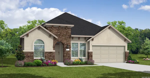 a front view of a house with a garden and plants