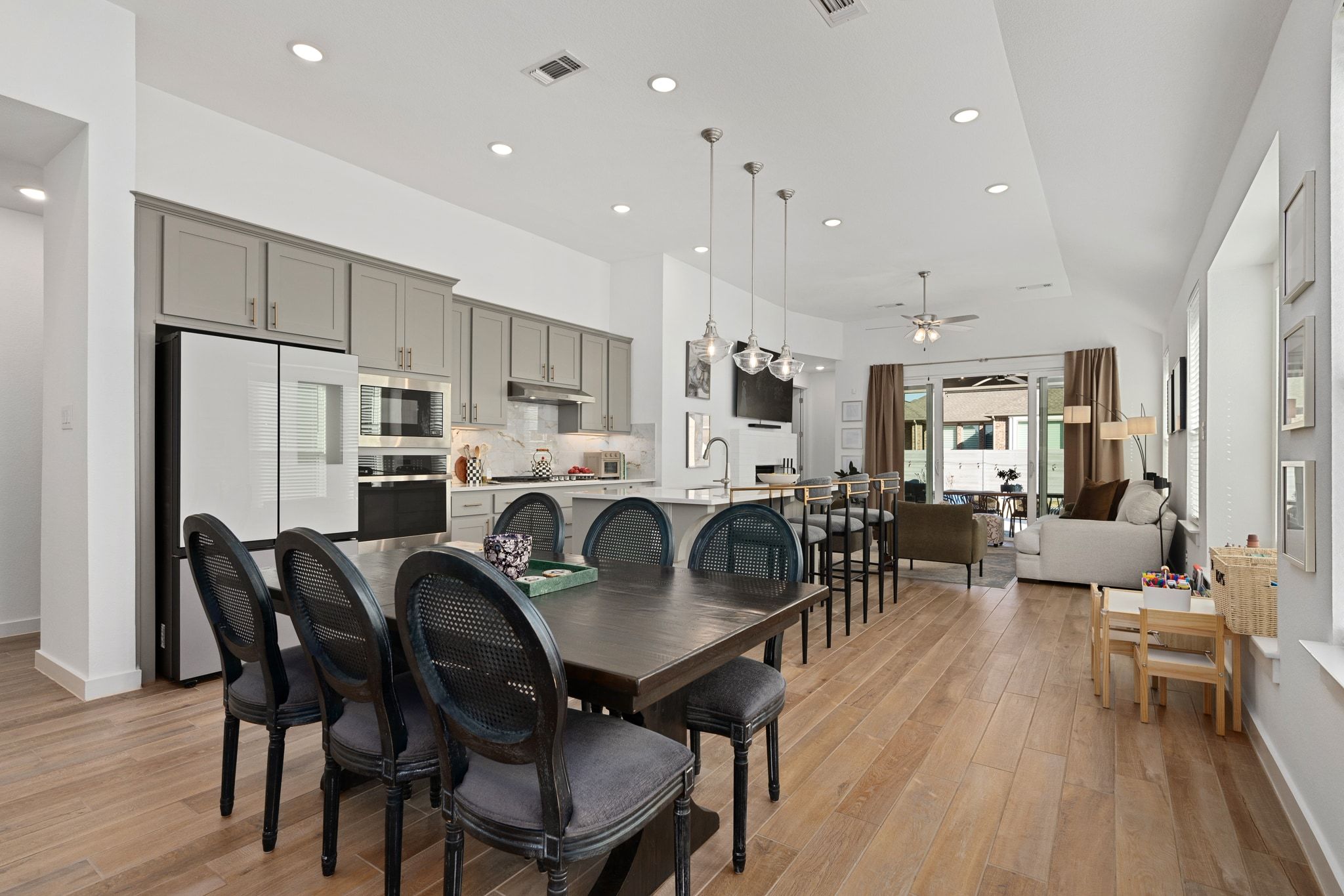 1201 Highcrest Georgetown, TX 78628 - Photo 13 of 40 a view of a dining room with furniture and wooden floor