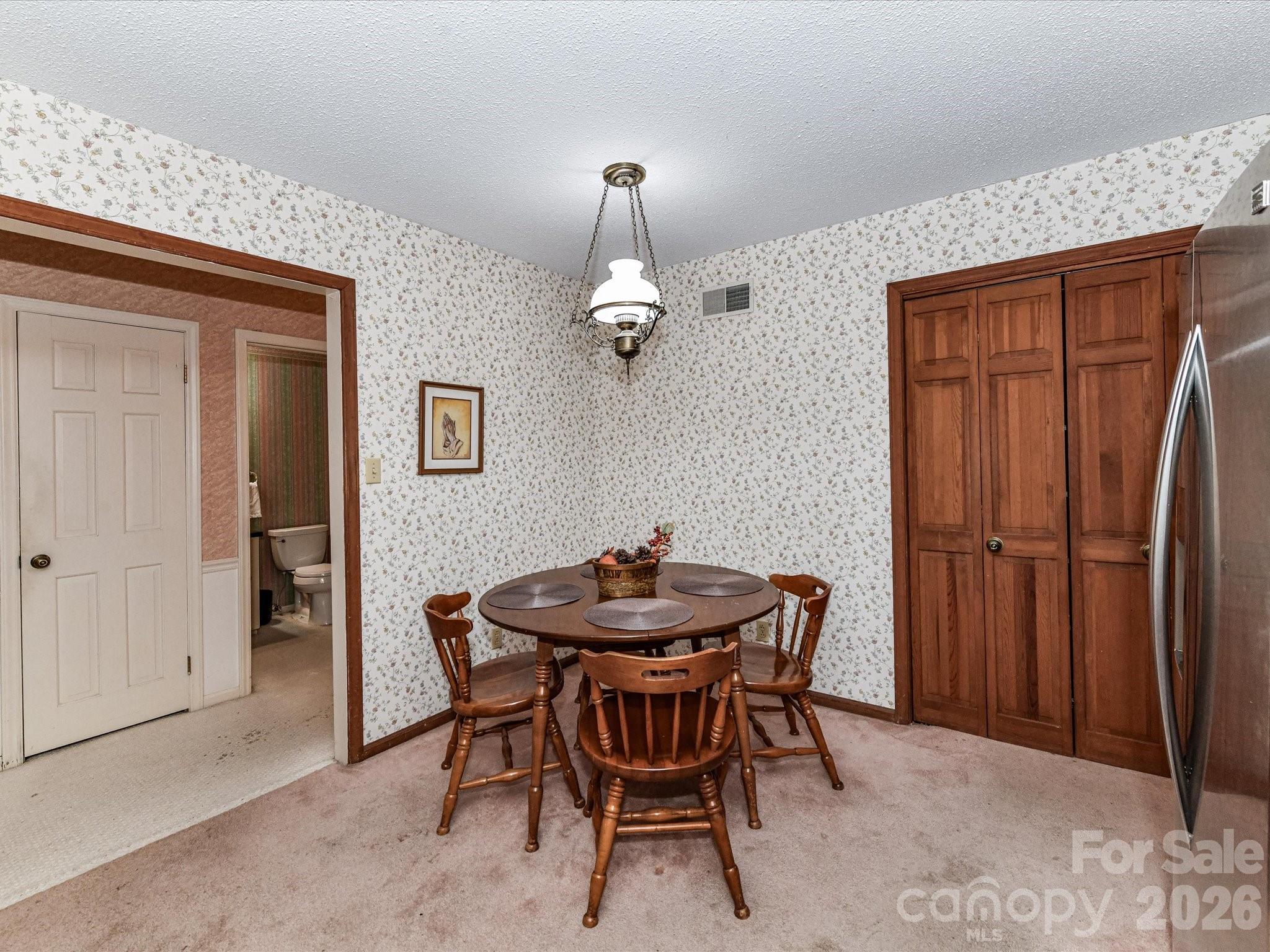 127 Todd Circle Wingate, NC 28174 - Photo 13 of 36 a dining room with furniture and window