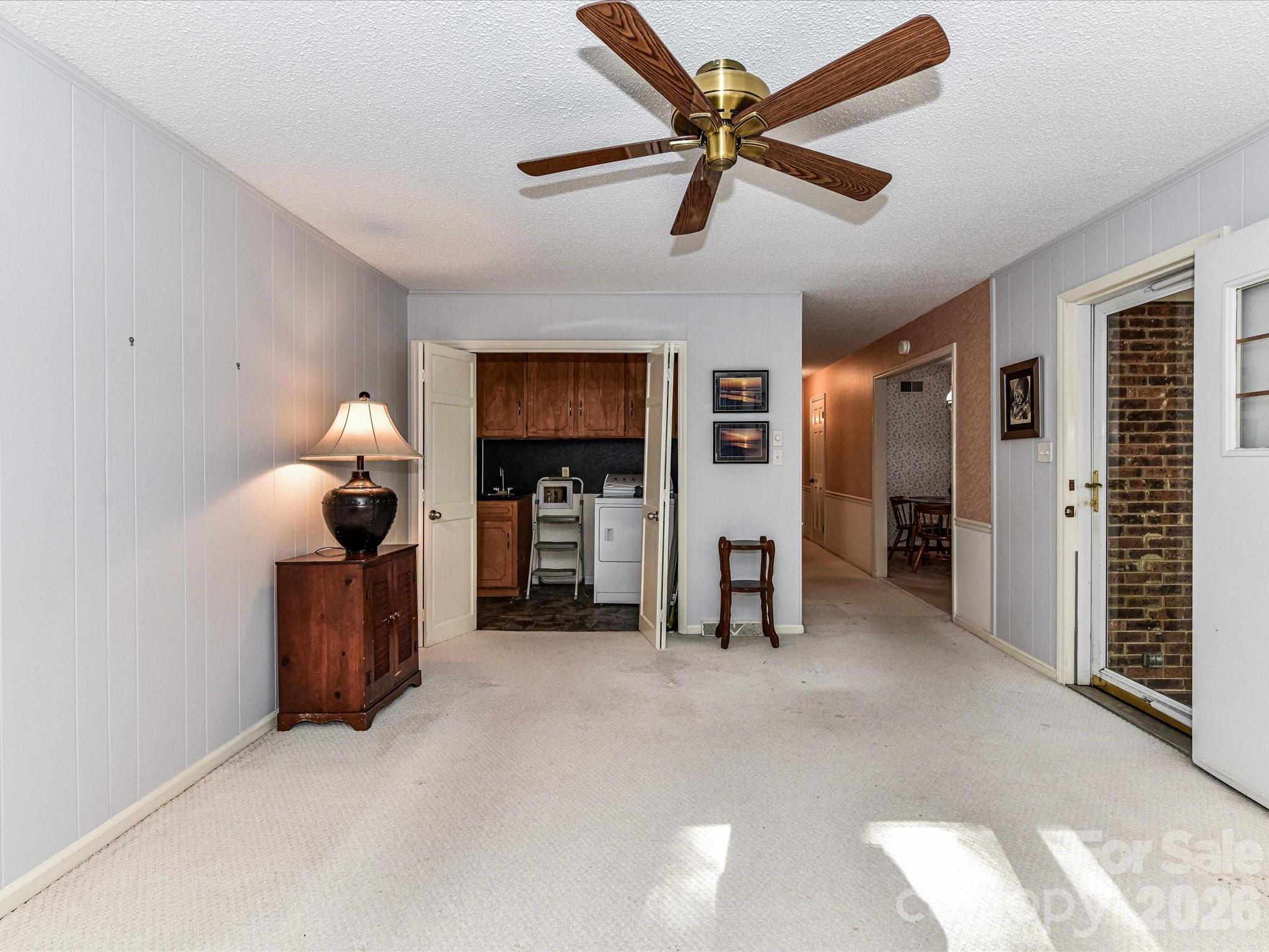 127 Todd Circle Wingate, NC 28174 - Photo 15 of 36 a living room with furniture and a flat screen tv