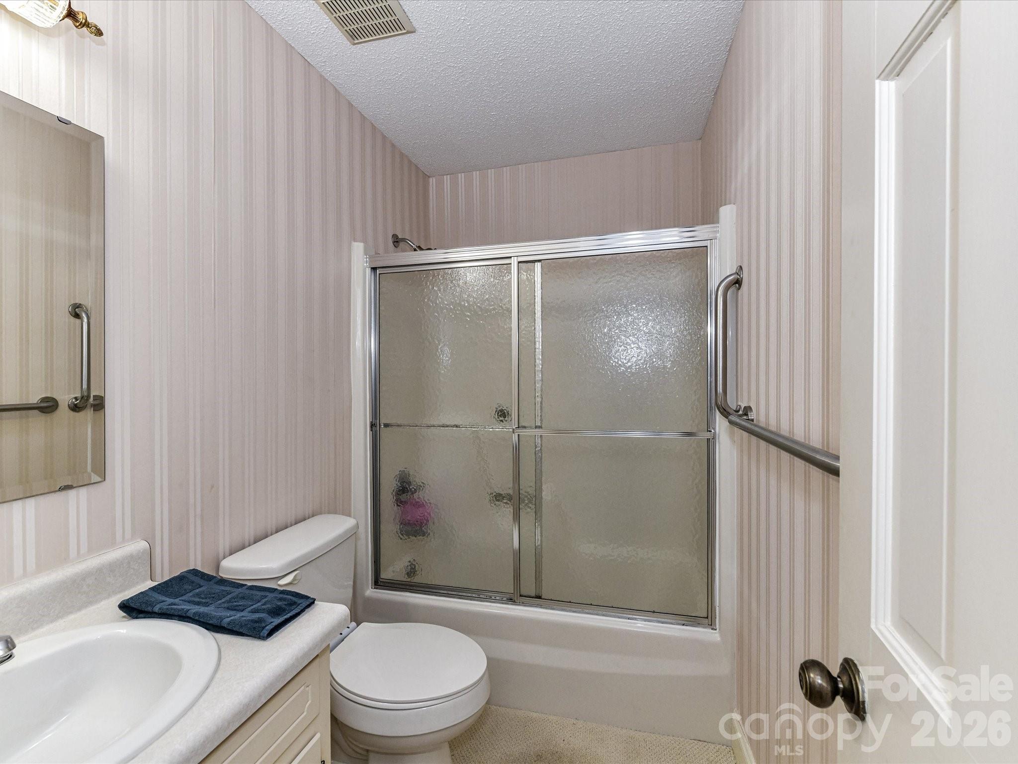 127 Todd Circle Wingate, NC 28174 - Photo 22 of 36 a bathroom with a sink toilet and shower