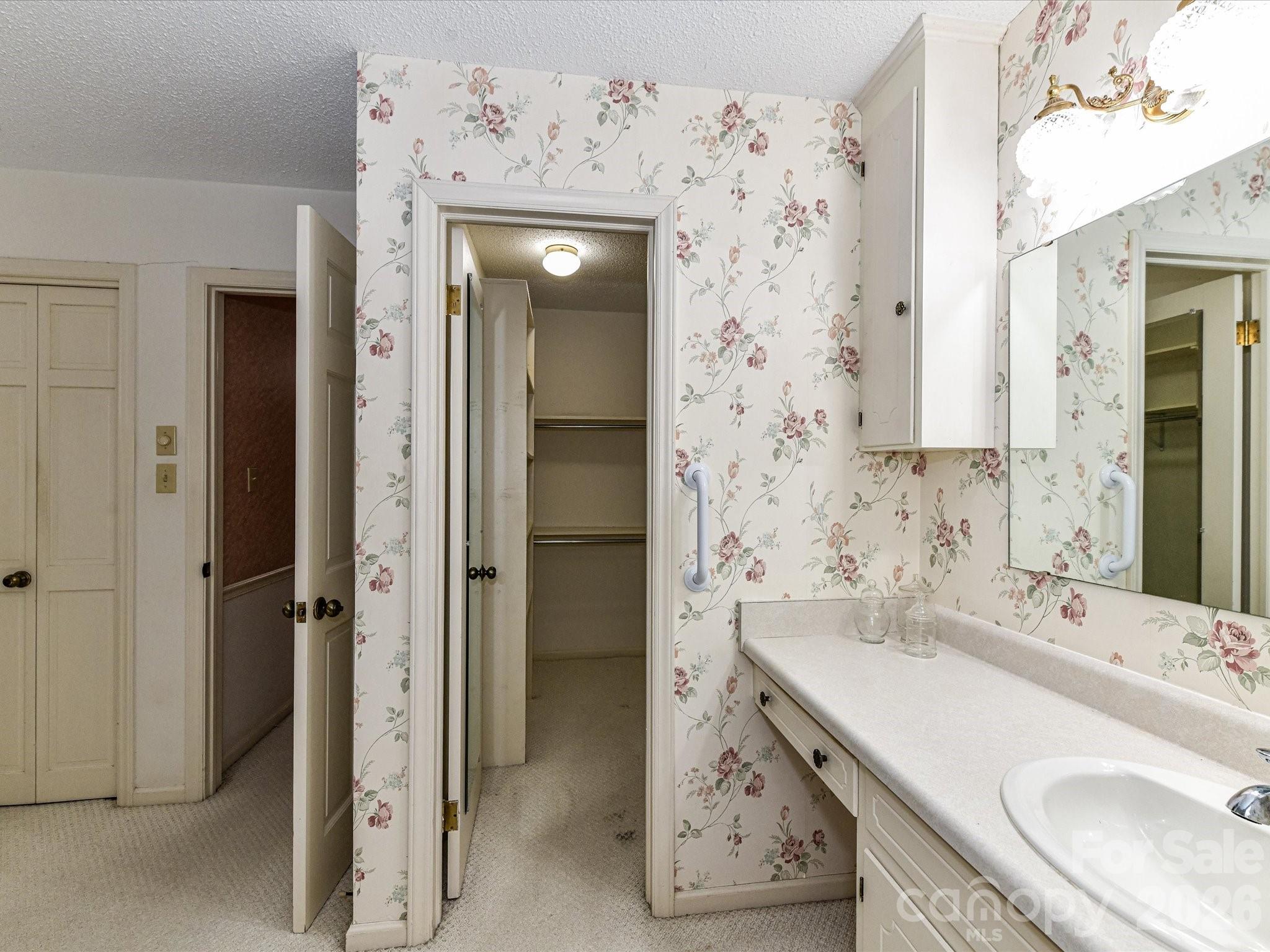 127 Todd Circle Wingate, NC 28174 - Photo 23 of 36 a bathroom with a sink and a mirror