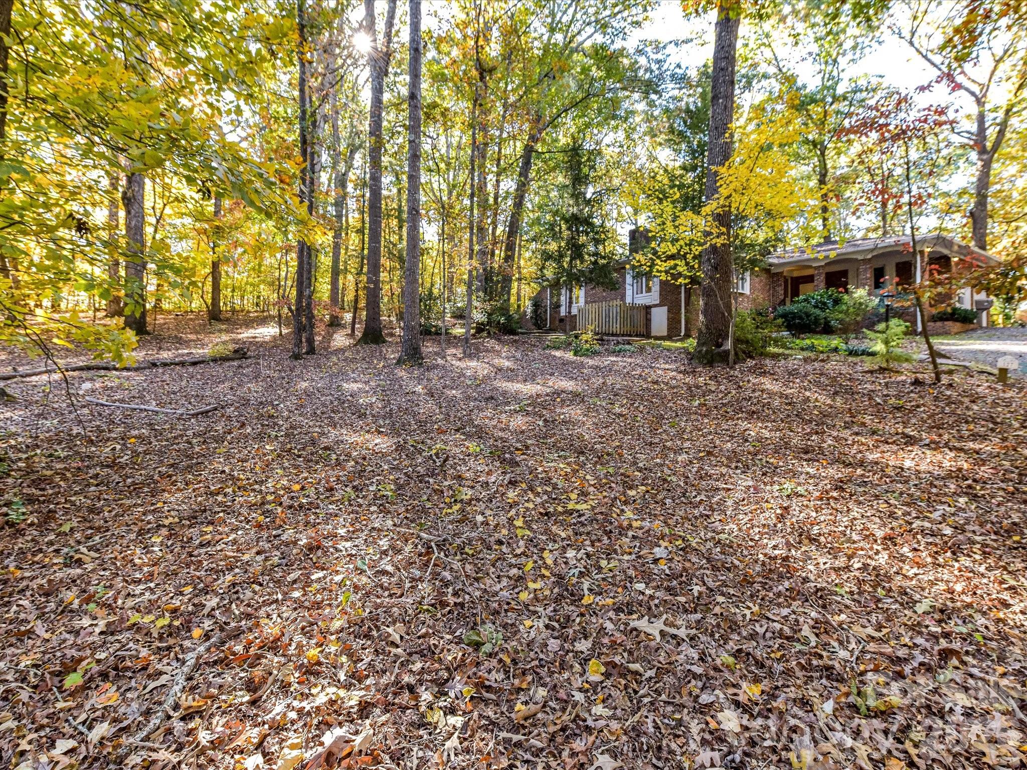 127 Todd Circle Wingate, NC 28174 - Photo 35 of 36 a view of outdoor space with deck and trees