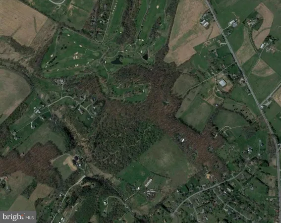 an aerial view of a tennis ground