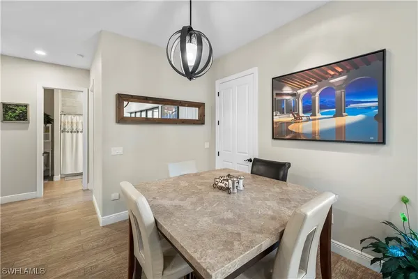 a view of a dining room with furniture
