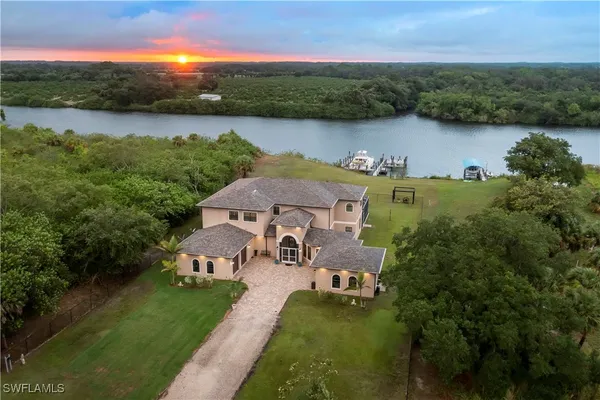 an aerial view of a house with garden space and outdoor space