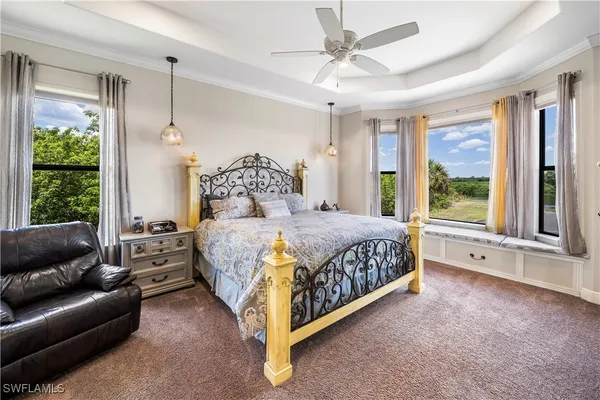 a bed room with a bed and a couch