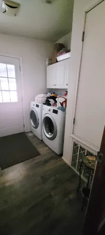 a view of a bathroom from a hallway