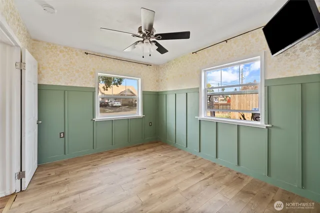 a view of a livingroom with a flat screen tv