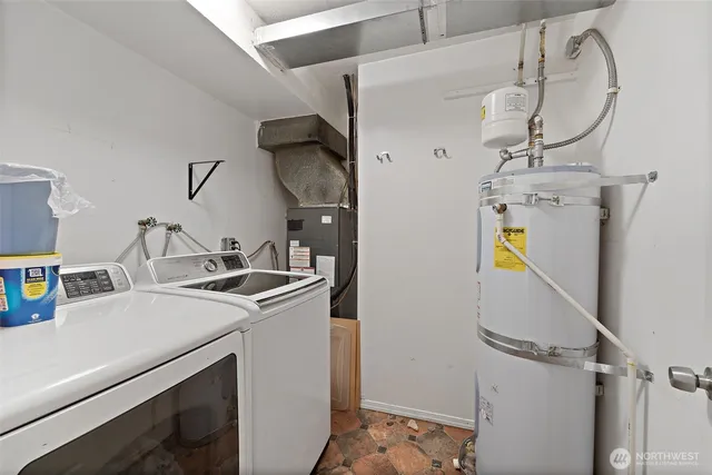 a utility room with dryer and washer