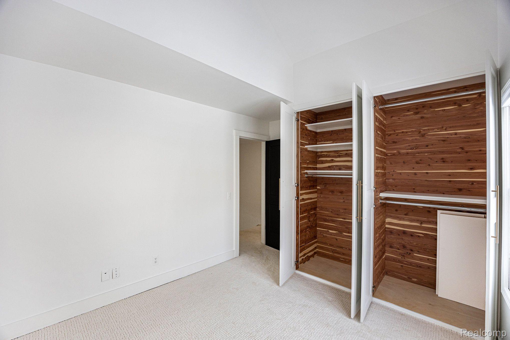 1006 Pointe Pl Boulevard Rochester, MI 48307 - Photo 18 of 33 Brand New Cedar Lined Closet in Guest Bedroom.