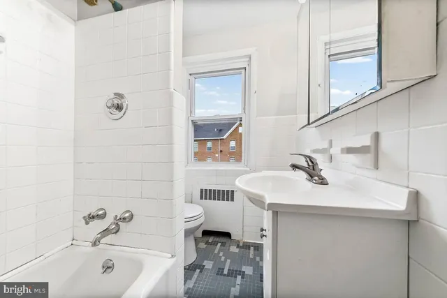 a white building with a white sink