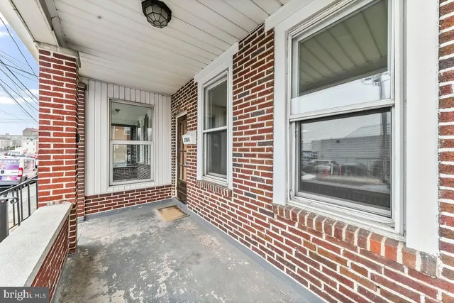 a view of a house with a door and a window