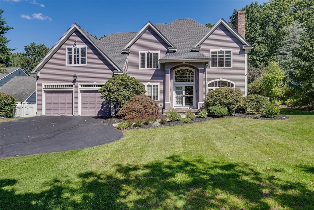 35 Buehler Road Bedford, MA 01730 - Photo 1 of 41 a front view of a house with garden