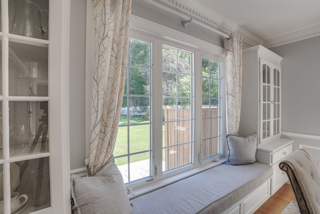 35 Buehler Road Bedford, MA 01730 - Photo 11 of 41 a bedroom with a bed and glass door