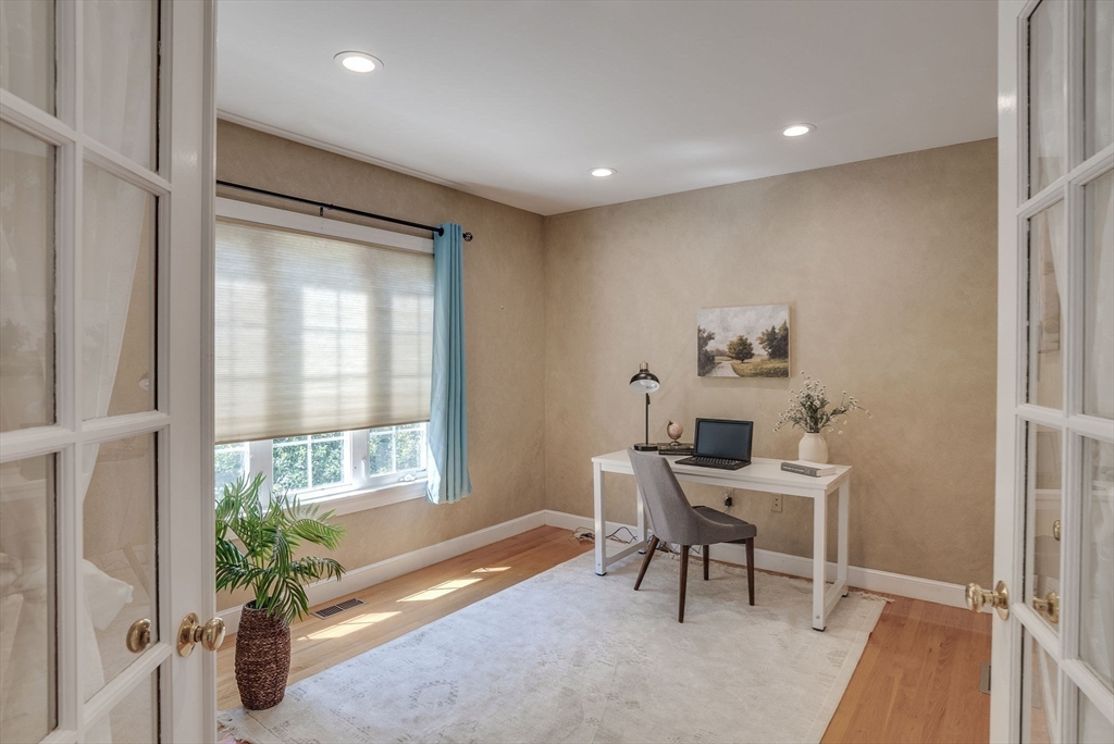 35 Buehler Road Bedford, MA 01730 - Photo 14 of 41 a workspace with furniture and a window