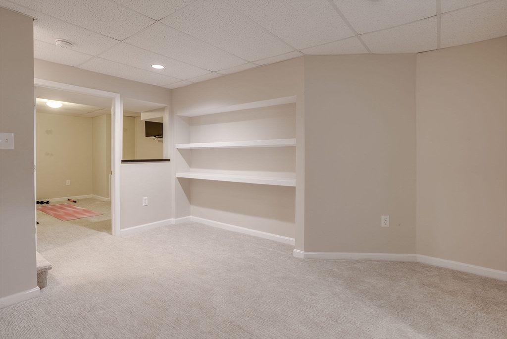 35 Buehler Road Bedford, MA 01730 - Photo 29 of 41 a view of an empty room and a gallery