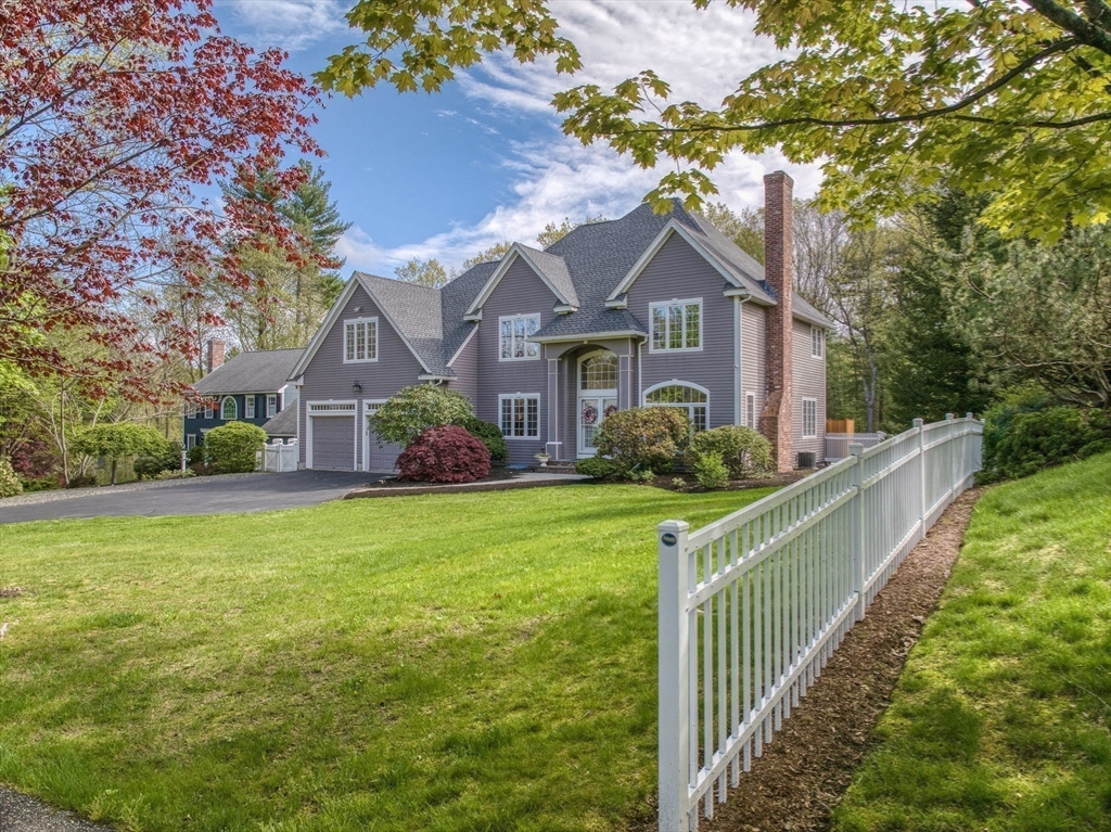 35 Buehler Road Bedford, MA 01730 - Photo 40 of 41 a front view of house with yard and trees