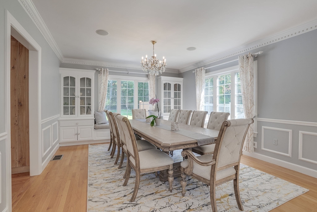 35 Buehler Road Bedford, MA 01730 - Photo 10 of 41 a view of a dining room with furniture window and wooden floor