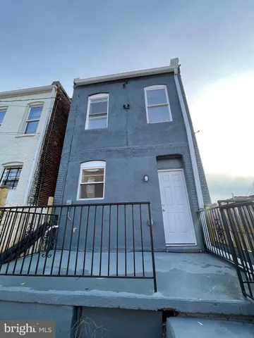 a view of balcony with furniture and wooden floor