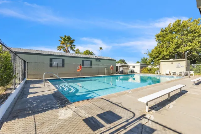 a view of a park with swings